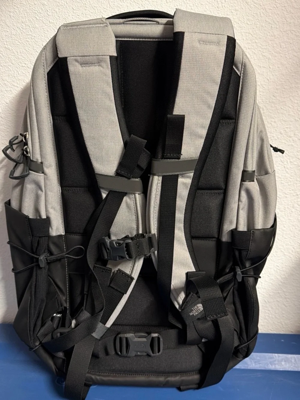 The North Face Light Gray and Black Backpack with Bungee Front